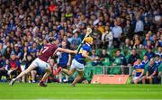 24 June 2023; Mark Kehoe of Tipperary is tackled by Joseph Cooney of Galway during the GAA Hurling All-Ireland Senior Championship Quarter Final match between Galway and Tipperary at TUS Gaelic Grounds in Limerick. Photo by Ray McManus/Sportsfile