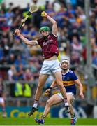 24 June 2023; Cianan Fahy of Galway wins possession ahead of Bryan O'Mara of Tipperary during the GAA Hurling All-Ireland Senior Championship Quarter Final match between Galway and Tipperary at TUS Gaelic Grounds in Limerick. Photo by Ray McManus/Sportsfile