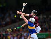 24 June 2023; Kevin Cooney of Galway and Michael Breen of Tipperary reach for the sliotar during the GAA Hurling All-Ireland Senior Championship Quarter Final match between Galway and Tipperary at TUS Gaelic Grounds in Limerick. Photo by Ray McManus/Sportsfile