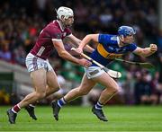 24 June 2023; Jason Forde of Tipperary in action against Gearóid McInerney of Galway during the GAA Hurling All-Ireland Senior Championship Quarter Final match between Galway and Tipperary at TUS Gaelic Grounds in Limerick. Photo by Piaras Ó Mídheach/Sportsfile