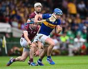 24 June 2023; Conor Bowe of Tipperary gets away from Galway players Pádraic Mannion, 5, and Daithí Burke of Galway during the GAA Hurling All-Ireland Senior Championship Quarter Final match between Galway and Tipperary at TUS Gaelic Grounds in Limerick. Photo by Piaras Ó Mídheach/Sportsfile