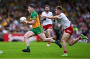 24 June 2023; Jamie Brennan of Donegal in action against Cormac Quinn of Tyrone during the GAA Football All-Ireland Senior Championship Preliminary Quarter Final match between Donegal and Tyrone at MacCumhaill Park in Ballybofey, Donegal. Photo by Brendan Moran/Sportsfile