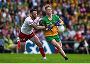 24 June 2023; Oisin Gallen of Donegal is dispossessed by Ronan McNamee of Tyrone during the GAA Football All-Ireland Senior Championship Preliminary Quarter Final match between Donegal and Tyrone at MacCumhaill Park in Ballybofey, Donegal. Photo by Brendan Moran/Sportsfile