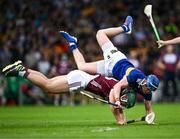 24 June 2023; Fintan Burke of Galway is fouled by Conor Bowe of Tipperary during the GAA Hurling All-Ireland Senior Championship Quarter Final match between Galway and Tipperary at TUS Gaelic Grounds in Limerick. Photo by Piaras Ó Mídheach/Sportsfile