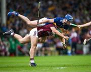 24 June 2023; Fintan Burke of Galway is fouled by Conor Bowe of Tipperary during the GAA Hurling All-Ireland Senior Championship Quarter Final match between Galway and Tipperary at TUS Gaelic Grounds in Limerick. Photo by Piaras Ó Mídheach/Sportsfile