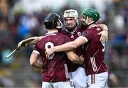 24 June 2023; Galway players, from left, Seán Linnane, Darren Morrissey and Cathal Mannion celebrate after their side's victory in the GAA Hurling All-Ireland Senior Championship Quarter Final match between Galway and Tipperary at TUS Gaelic Grounds in Limerick. Photo by Piaras Ó Mídheach/Sportsfile