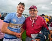 24 June 2023; Cathal Mannion of Galway is congratulated by Galway supporter Padraig Burkley, from Athenry, after the GAA Hurling All-Ireland Senior Championship Quarter Final match between Galway and Tipperary at TUS Gaelic Grounds in Limerick. Photo by Ray McManus/Sportsfile
