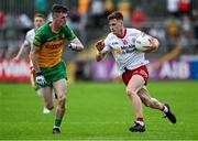 24 June 2023; Conor Meyler of Tyrone in action against Caolan Ward of Donegal during the GAA Football All-Ireland Senior Championship Preliminary Quarter Final match between Donegal and Tyrone at MacCumhaill Park in Ballybofey, Donegal. Photo by Brendan Moran/Sportsfile