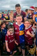 24 June 2023; Cianan Fahy of Galway with supporters including Conor, Enna and Daithí Fanning, from Oranmore, after the GAA Hurling All-Ireland Senior Championship Quarter Final match between Galway and Tipperary at TUS Gaelic Grounds in Limerick. Photo by Ray McManus/Sportsfile