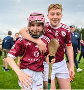 24 June 2023; Michael Barrett, left, and Gavin Egan of Athenry celebrate after the John West Féile na nGael Division one cup final at Connacht GAA Centre of Excellence in Bekan, Mayo. Photo by Stephen Marken/Sportsfile