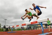 24 June 2023; Matei Ursachi, left, from St Pauls Raheny, Leinster, on his way to winning the Boys 1500m Steeplechase from second place Diarmuid Moloney, Munster from Nenagh CBS during the 123.ie Tailteann School’s Interprovincial Games at the SETU Campus in Carlow. Photo by Matt Browne/Sportsfile