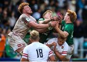 24 June 2023; England captain Lewis Chessum, left, contests a high ball against Andrew Osborne and Hugh Cooney of Ireland during the U20 Rugby World Cup match between England and Ireland at Paarl Gymnasium in Paarl, South Africa. Photo by Shaun Roy/Sportsfile
