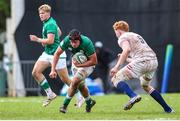 24 June 2023; James McNabney of Ireland attempts to get past England captain Lewis Chessum during the U20 Rugby World Cup match between England and Ireland at Paarl Gymnasium in Paarl, South Africa. Photo by Shaun Roy/Sportsfile