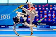 25 June 2023; Leroy Dilandu of Ireland, left, in action against Zurab Kintsurashvili of Georgia in the Taekwando Men's 58kg round of 16 match at the Krynica-Zdrój Arena during the European Games 2023 in Poland. Photo by Tyler Miller/Sportsfile