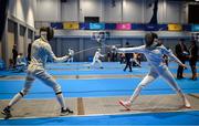 25 June 2023; Isobel Radford-Dodd of Ireland of Ireland, right, in action against Luca Barta of Hungary in the Women's Modern Pentathlon at the AWF Sports Centre Arena during the European Games 2023 in Krakow, Poland. Photo by David Fitzgerald/Sportsfile