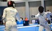 25 June 2023; Sive Brassil of Ireland, right, in action against Luca Barta of Hungary in the Women's Modern Pentathlon at the AWF Sports Centre Arena during the European Games 2023 in Krakow, Poland. Photo by David Fitzgerald/Sportsfile