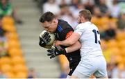 24 June 2023; Monaghan goalkeeper Rory Beggan in action against Neil Flynn of Kildare during the GAA Football All-Ireland Senior Championship Preliminary Quarter Final match between Kildare and Monaghan at Glenisk O'Connor Park in Tullamore, Offaly. Photo by Seb Daly/Sportsfile