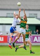 24 June 2023; Evan Boyle of Kerry in action against Conor Jones of Monaghan during the Electric Ireland GAA All-Ireland Football Minor Championship Semi-Final match between Kerry and Monaghan at Glenisk O'Connor Park in Tullamore, Offaly. Photo by Seb Daly/Sportsfile