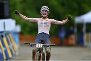 25 June 2023; Puck Pieterse of Netherlands celebrates after finishing first in the women's mountain bike cross country final at the Krynica-Zdrój Hill Park during the European Games 2023 in Poland. Photo by Tyler Miller/Sportsfile