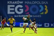 25 June 2023; Jordan Conroy of Ireland is tackled by Wojciech Brzezicki of Poland in the Men's Rugby Sevens match between Ireland and Poland at the Henryk Reyman Stadium during the European Games 2023 in Krakow, Poland. Photo by David Fitzgerald/Sportsfile