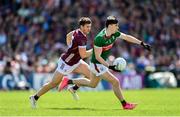 25 June 2023; Sam Callinan of Mayo in action against Shane Walsh of Galway during the GAA Football All-Ireland Senior Championship Preliminary Quarter Final match between Galway and Mayo at Pearse Stadium in Galway. Photo by Seb Daly/Sportsfile