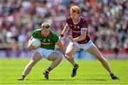 25 June 2023; Ryan O'Donoghue of Mayo in action against Peter Cooke of Galway during the GAA Football All-Ireland Senior Championship Preliminary Quarter Final match between Galway and Mayo at Pearse Stadium in Galway. Photo by Seb Daly/Sportsfile