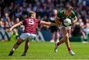 25 June 2023; Jordan Flynn of Mayo is tackled by Cian Hernon of Galway during the GAA Football All-Ireland Senior Championship Preliminary Quarter Final match between Galway and Mayo at Pearse Stadium in Galway. Photo by Brendan Moran/Sportsfile