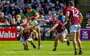 25 June 2023; Cian Hernon, left, and Jack Glynn of Galway block a shot by Tommy Conroy of Mayo during the GAA Football All-Ireland Senior Championship Preliminary Quarter Final match between Galway and Mayo at Pearse Stadium in Galway. Photo by Brendan Moran/Sportsfile