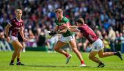 25 June 2023; Jordan Flynn of Mayo is tackled by John Daly of Galway during the GAA Football All-Ireland Senior Championship Preliminary Quarter Final match between Galway and Mayo at Pearse Stadium in Galway. Photo by Brendan Moran/Sportsfile