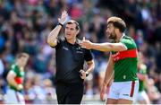 25 June 2023; Aidan O'Shea of Mayo remonstrates with referee Sean Hurson during the GAA Football All-Ireland Senior Championship Preliminary Quarter Final match between Galway and Mayo at Pearse Stadium in Galway. Photo by Seb Daly/Sportsfile