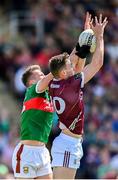 25 June 2023; Matthew Tierney of Galway in action against Eoghan McLaughlin of Mayo during the GAA Football All-Ireland Senior Championship Preliminary Quarter Final match between Galway and Mayo at Pearse Stadium in Galway. Photo by Seb Daly/Sportsfile