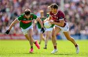 25 June 2023; Shane Walsh of Galway in action against Sam Callinan of Mayo during the GAA Football All-Ireland Senior Championship Preliminary Quarter Final match between Galway and Mayo at Pearse Stadium in Galway. Photo by Seb Daly/Sportsfile