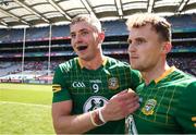 25 June 2023; Meath players Conor Gray, left, and Ronan Jones after their side's victory in the Tailteann Cup Semi Final match between Antrim and Meath at Croke Park in Dublin. Photo by Michael P Ryan/Sportsfile