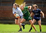 25 June 2023; Evelyn O'Brien of Waterford in action against Aoife Minogue of Meath during the TG4 Ladies Football All-Ireland Championship match between Waterford and Meath at Fraher Field in Dungarvan, Waterford. Photo by Matt Browne/Sportsfile