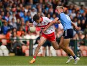 25 June 2023; James Sargent of Derry in action against Senan Ryan of Dublin during the Electric Ireland GAA Football All-Ireland Minor Championship Semi Final match between Dublin and Derry at Box-It Athletic Grounds in Armagh. Photo by Sam Barnes/Sportsfile