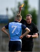 25 June 2023; Referee Sean Laverty shows a yellow card to Ryan Mitchell of Dublin during the Electric Ireland GAA Football All-Ireland Minor Championship Semi Final match between Dublin and Derry at Box-It Athletic Grounds in Armagh. Photo by Sam Barnes/Sportsfile