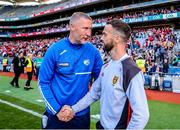 25 June 2023; Laois manager Billy Sheehan, left, shakes hands with Down manager Conor Laverty after the Tailteann Cup Semi Final match between Down and Laois at Croke Park in Dublin. Photo by Michael P Ryan/Sportsfile