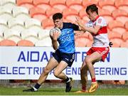 25 June 2023; Andrew O'Reilly of Dublin in action against James Sargent of Derry during the Electric Ireland GAA Football All-Ireland Minor Championship Semi Final match between Dublin and Derry at Box-It Athletic Grounds in Armagh. Photo by Sam Barnes/Sportsfile