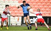 25 June 2023; Andrew O'Reilly of Dublin in action against Fionn McEldowney, right, and Johnny McGuckin of Derry during the Electric Ireland GAA Football All-Ireland Minor Championship Semi Final match between Dublin and Derry at Box-It Athletic Grounds in Armagh. Photo by Sam Barnes/Sportsfile
