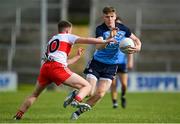 25 June 2023; Shane Mullarkey of Dublin in action against Eamon Young of Derry during the Electric Ireland GAA Football All-Ireland Minor Championship Semi Final match between Dublin and Derry at Box-It Athletic Grounds in Armagh. Photo by Sam Barnes/Sportsfile