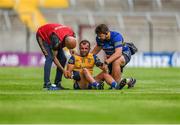 24 June 2023; Donie Smith of Roscommon receives attention during the GAA Football All-Ireland Senior Championship Preliminary Quarter Final match between Cork and Roscommon at Páirc Uí Chaoimh in Cork. Photo by Tom Beary/Sportsfile