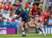 24 June 2023; Conor Carroll of Roscommon in action against Rory Maguire of Cork during the GAA Football All-Ireland Senior Championship Preliminary Quarter Final match between Cork and Roscommon at Páirc Uí Chaoimh in Cork. Photo by Tom Beary/Sportsfile
