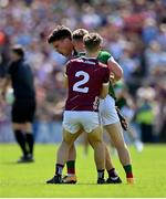 25 June 2023; Seán Kelly of Galway, behind, reacts after having his ankle kicked by Mayo's Ryan O'Donoghue during the GAA Football All-Ireland Senior Championship Preliminary Quarter Final match between Galway and Mayo at Pearse Stadium in Galway. Photo by Seb Daly/Sportsfile