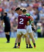 25 June 2023; Seán Kelly of Galway, behind, reacts after having his ankle kicked by Mayo's Ryan O'Donoghue during the GAA Football All-Ireland Senior Championship Preliminary Quarter Final match between Galway and Mayo at Pearse Stadium in Galway. Photo by Seb Daly/Sportsfile