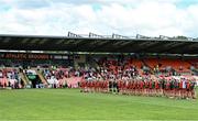 25 June 2023; Both sides stand in protest during the national anthem before the TG4 Ladies Football All-Ireland Championship match between Armagh and Mayo at BOX-IT Athletic Grounds in Armagh. Photo by Sam Barnes/Sportsfile