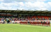 25 June 2023; Both sides stand in protest during the national anthem before the TG4 Ladies Football All-Ireland Championship match between Armagh and Mayo at BOX-IT Athletic Grounds in Armagh. Photo by Sam Barnes/Sportsfile