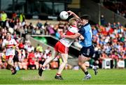 25 June 2023; Noah Byrne of Dublin in action against Fionn McEldowney of Derry during the Electric Ireland GAA Football All-Ireland Minor Championship Semi Final match between Dublin and Derry at Box-It Athletic Grounds in Armagh. Photo by Sam Barnes/Sportsfile