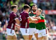 25 June 2023; Ryan O'Donoghue of Mayo tussles with Seán Kelly of Galway, 3, during the GAA Football All-Ireland Senior Championship Preliminary Quarter Final match between Galway and Mayo at Pearse Stadium in Galway. Photo by Seb Daly/Sportsfile