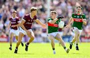 25 June 2023; Eoghan McLaughlin of Mayo in action against Cian Hernon of Galway during the GAA Football All-Ireland Senior Championship Preliminary Quarter Final match between Galway and Mayo at Pearse Stadium in Galway. Photo by Seb Daly/Sportsfile