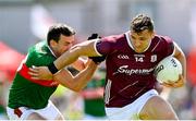 25 June 2023; Damien Comer of Galway in action against Jason Doherty of Mayo  during the GAA Football All-Ireland Senior Championship Preliminary Quarter Final match between Galway and Mayo at Pearse Stadium in Galway. Photo by Seb Daly/Sportsfile